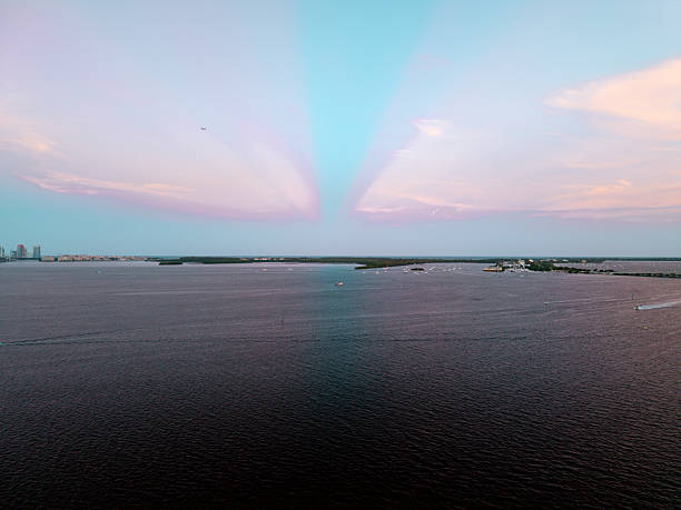 Sunset drone view of the Miami skyline from over Biscayne Bay