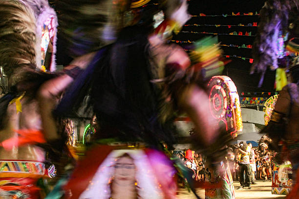 Dancers in traditional indigenous-inspired costumes during a performance of the Bumba Boi folk dance in the city of São Luis, Maranhão, northeastern Brazil