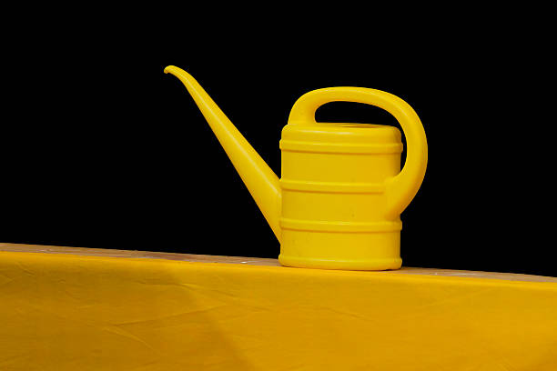 The bright can agains the black background makes it stand out and allows space for text or graphics.