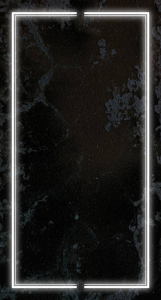 istock White neon frame on dark textured dirty cement wall and copy space 2228724082
