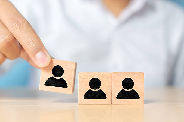 istock Wooden cube with human symbol 2228725554