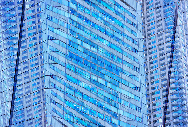 Minneapolis, Minnesota, USA - July 21, 2024: Facade of the IDS Center in downtown Minneapolis forms abstract geometric pattern