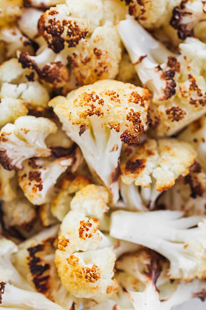 istock roasted cauliflower in glass container for healthy meal prep 2228730499