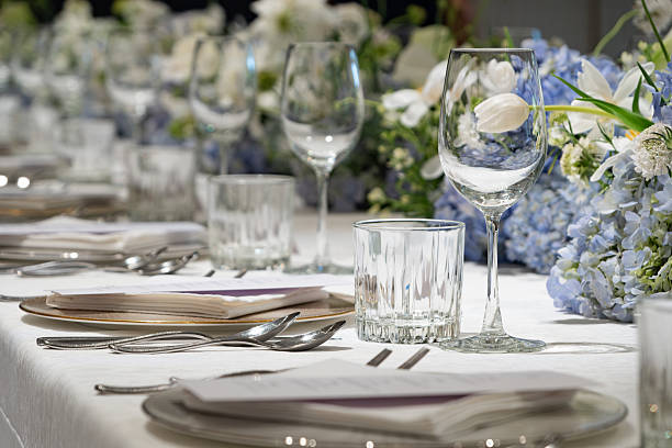 istock wedding reception dinner table suit set up with decoration flower before evening event start 2228731226