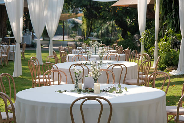 istock wedding reception dinner table suit at the garden in sunshine before event start 2228731634