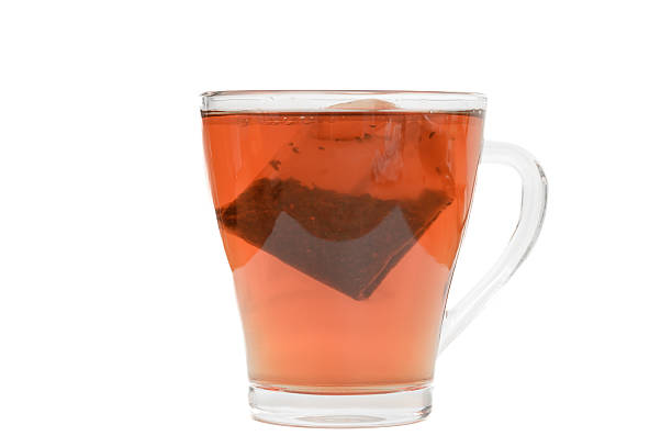 istock Transparent cup with black tea, cup on a white background, space for inscriptions 2228738860