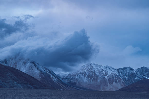 istock Storm clouds over snow-covered Himalayan peaks in Ladakh India creating dramatic remote mountain landscape 2228739769
