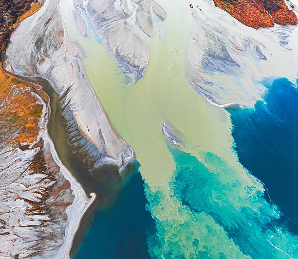 istock Lake receiving river tributary, drone view. 2228741211