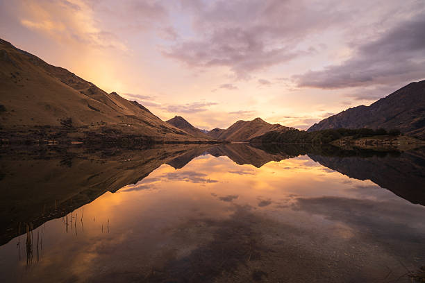 Moke Lake reflection after sunset in Queenstown, South Island, New Zealand.