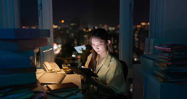 istock asian businesswoman using tablet pc check information 2228742304