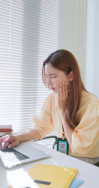 istock businesswoman has toothache 2228743665