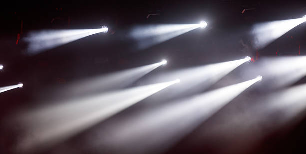 istock A series of white lights are shining on a dark background 2228748148