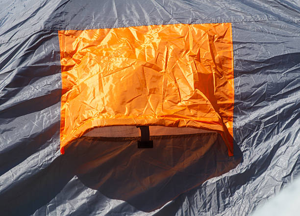istock A tent with a red flap on the side 2228748240