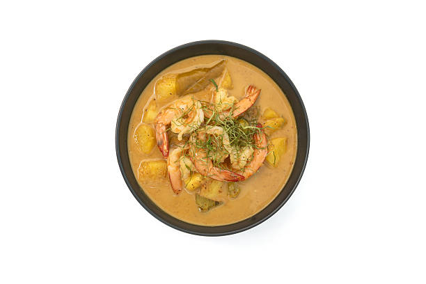 istock Pineapple curry  milk coconut with shrimp on isolated white background 2228750966