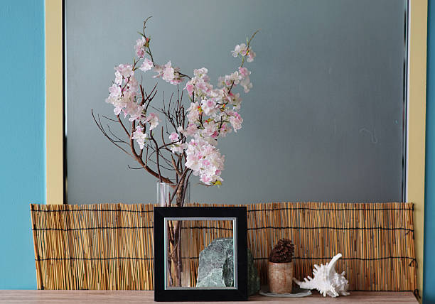 istock Still life of table decoration, Flower and frame decoration at table with window background 2228752009