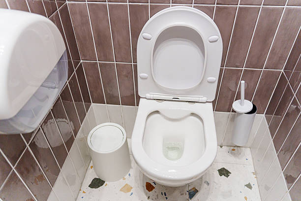 istock Modern restroom interior featuring a clean toilet and essential accessories 2228752927