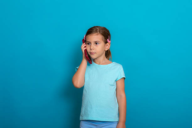 Side view of caucasian shouting girl on pure white background.