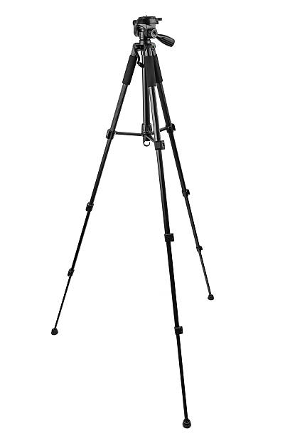 istock A black camera tripod with a fluid head and extended legs, isolated on white. 2228759610