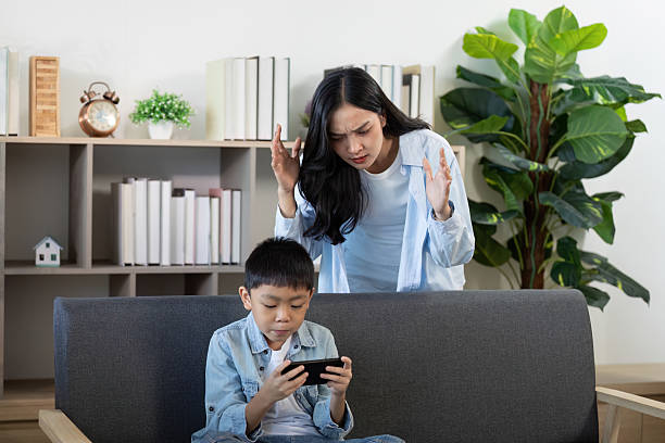 istock Parent-Child Interaction: Frustration Over Screen Time Management 2228761006