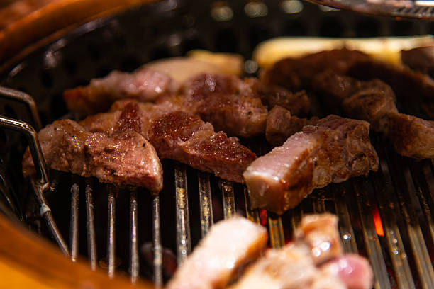 istock grilling pork on the charcoal grill 2228761820