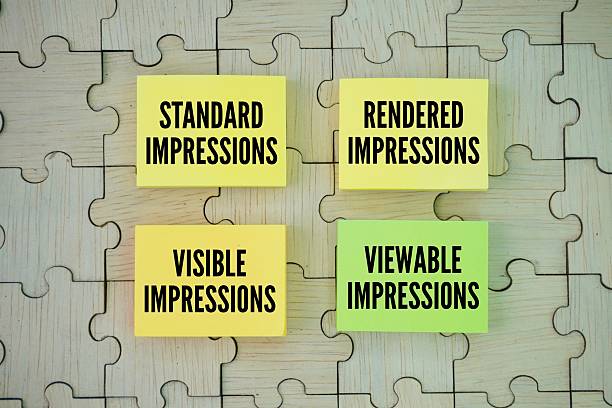 istock four types of impressions tracked in digital advertising and analytics: standard impressions, rendered impressions, visible impressions, and viewable impressions. 2228762977