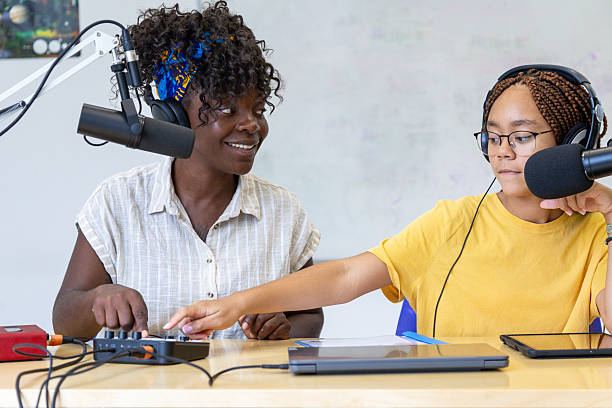 istock Two young female radio hosts recording a podcast 2228763143