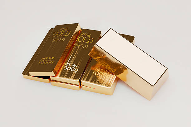 istock Stack of shiny gold bars on a light background symbolizing wealth, investment, financial security, banking, luxury, and economic success. Perfect for finance and business-related themes. 2228763940