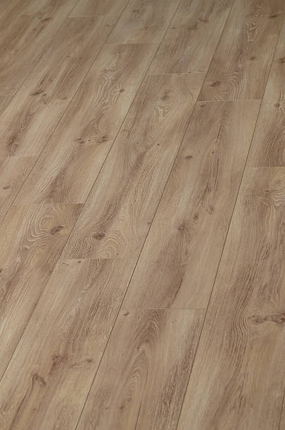 istock Laminate flooring panels laid on the floor, oak 2228764077