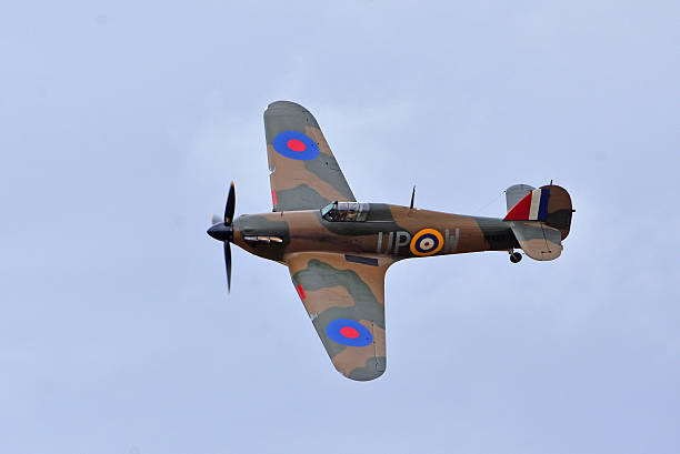 Little Gransden, Cambridgeshire, England -  August 25, 2024: Vintage  Hawker Hurricane Mk1 in flight