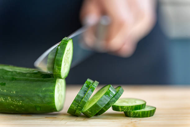 istock Fresh cucumber slices. Vegetable cutting. Healthy eating 2228769967