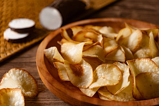 Authentic Indonesian Cassava Chips Paired with Raw Ingredient stock photo