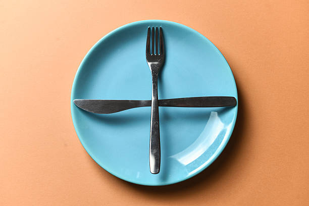 istock Fork And Knife Rested In Pause Position Signaling Readiness For The Next Course 2228773496