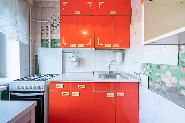 istock Retro Styled Home Kitchen Interior With Bright Red Cabinets and White Accents 2228774051