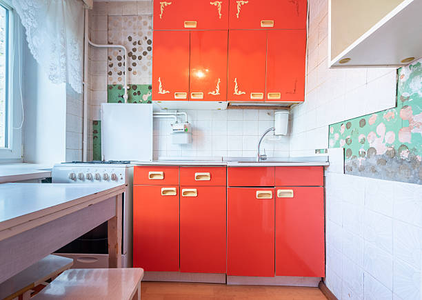 istock Retro Styled Home Kitchen Interior With Bright Red Cabinets and White Accents 2228774297