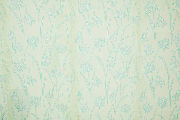 istock Old wallpaper on the wall. Old wallpaper for texture or background. 2228779053