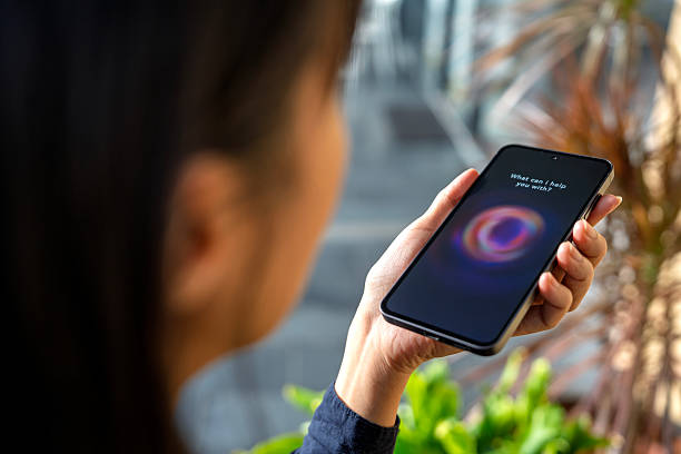 istock Woman Using AI Chatbot App on Smartphone Outdoors 2228780882