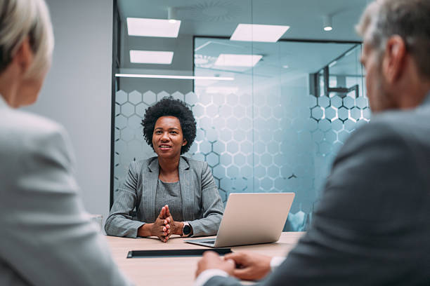 istock Group of business persons talking in the office. 2228780896