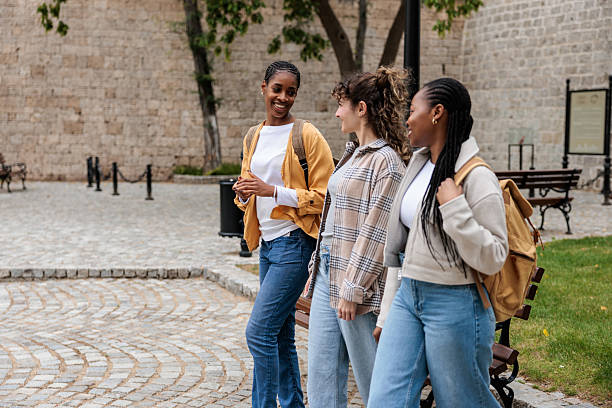 istock Female Friends Strolling in the City After Class 2228781442