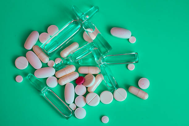 istock A bright and aesthetic composition of drugs in various forms: ampoules, tablets, and capsules. A healthy lifestyle, medicine, and healthcare. This photograph illustrates pharmacology and the importance of medication. 2228781490