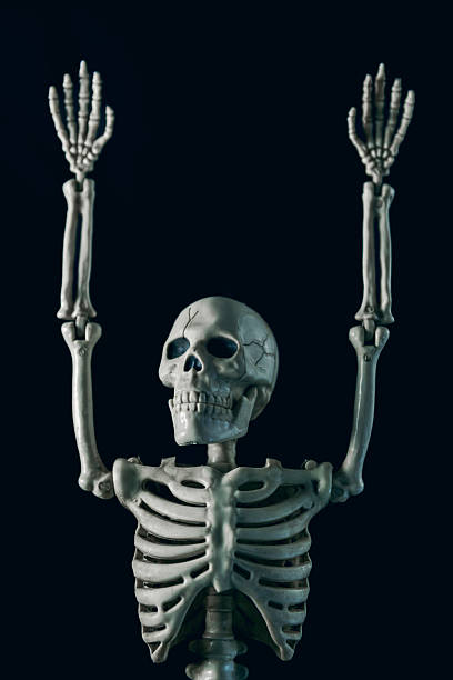 istock Halloween Skeleton With Arms in the Air 2228784232