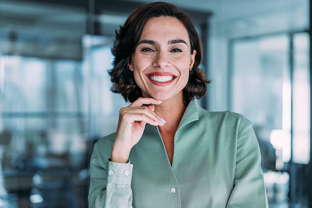 istock Confident businesswoman in modern office. 2228787511
