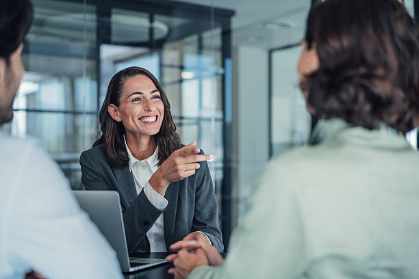 istock Group of business persons talking in the office. 2228787529