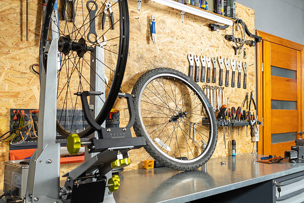 istock Wall organizer with wrenches, screwdrivers and pliers, bicycle wheel 2228794340