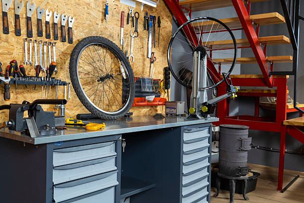 istock Wall organizer with wrenches, screwdrivers and pliers, bicycle wheel 2228794355