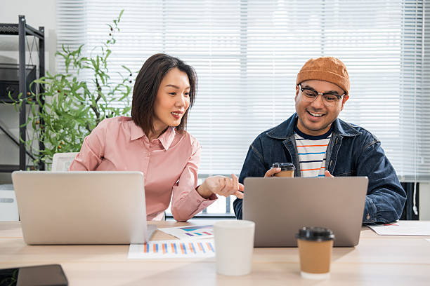 istock Asian business start up freelance people team analyzing statistics financial. Group Team of businesspeople man and woman Meeting Conference Discussion various topic Corporate Concept in office. 2228797154