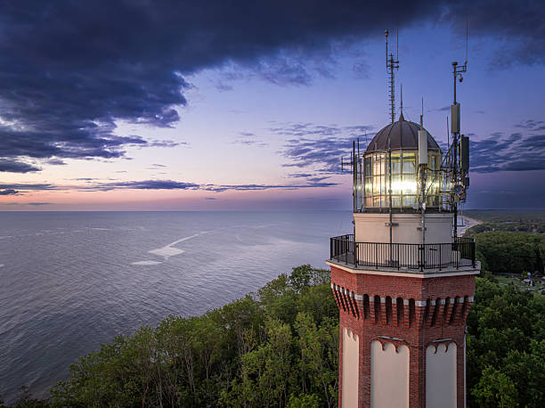 istock Unique lighthouse at sunset in Rewal at Baltic Sea. 2228797567