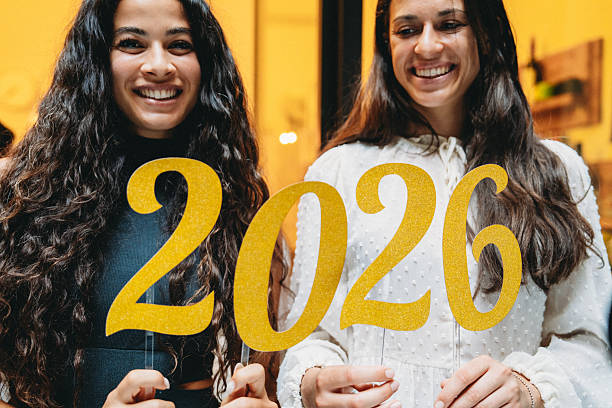 istock Two happy students celebrating their graduation in 2026 2228798531