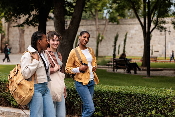 istock Women Friends Strolling in the City After Class 2228802976