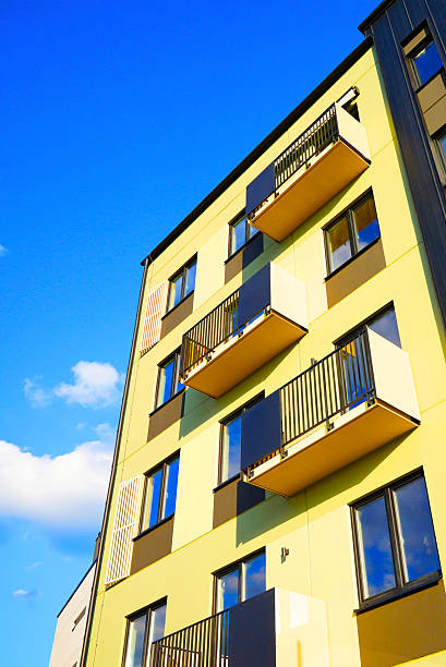 istock Balconies on blue sky, view up. New Apartment facade. 2228803162