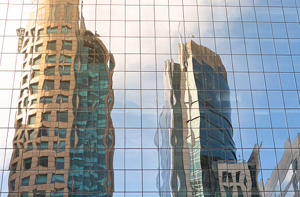 istock Background of reflection of buildings in another 2228807416